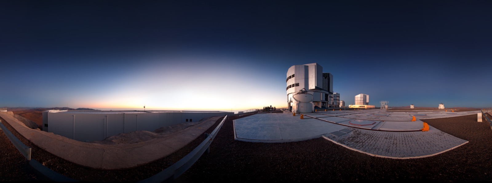 Panorama of ESO's Very Large Telescope on Cerro Paranal at sunset, with the four Unit Telescope enclosures.